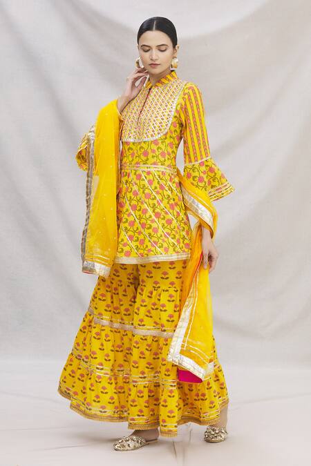 Kunwarani Ritu Yellow Cotton Mandarin Collar Floral Motif Peplum Kurta Set Online at Aza Fashions Kunwarani Ritu_Yellow Cotton Mandarin Collar Floral Motif Peplum Kurta Set _Online_at_Aza_Fashions