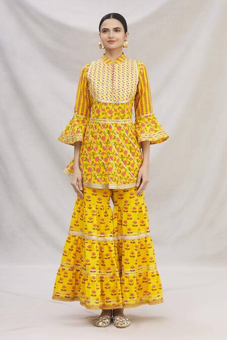 Buy Kunwarani Ritu Yellow Cotton Mandarin Collar Floral Motif Peplum Kurta Set Online at Aza Fashions Buy_Kunwarani Ritu_Yellow Cotton Mandarin Collar Floral Motif Peplum Kurta Set _Online_at_Aza_Fashions