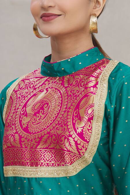 Kunwarani Ritu Green Silk High Neck Kurta Set at Aza Fashions Kunwarani Ritu_Green Silk High Neck Kurta Set _at_Aza_Fashions