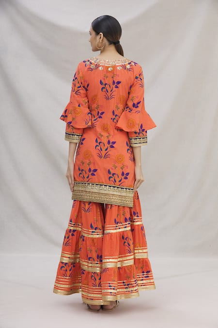 Shop Kunwarani Ritu Orange Cotton Round Printed Kurta Set at Aza Fashions Shop_Kunwarani Ritu_Orange Cotton Round Printed Kurta Set _at_Aza_Fashions