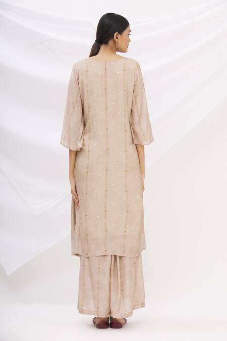 Shop 17:17 By Simmi Saboo Beige Cotton Silk Embroidery Round Pleated Kurta And Pant Set at Aza Fashions Shop_17:17 By Simmi Saboo_Beige Cotton Silk Embroidery Round Pleated Kurta And Pant Set _at_Aza_Fashions
