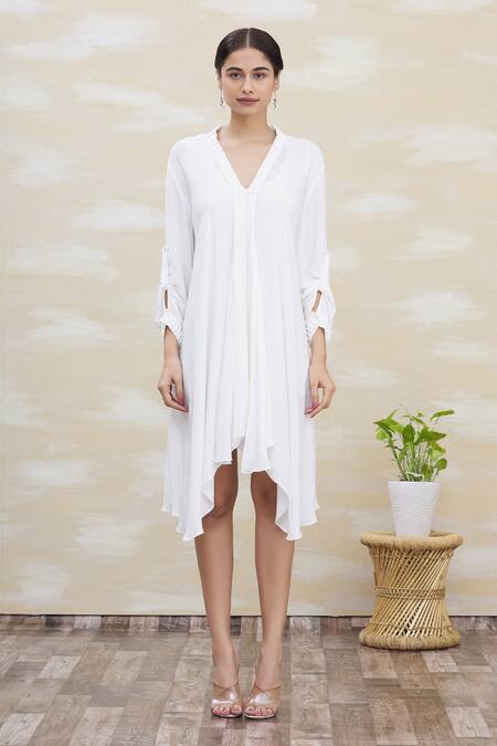 Buy Kommal Sood White Georgette Embroidery V Neck Asymmetrical Tunic Online at Aza Fashions Buy_Kommal Sood_White Georgette Embroidery V Neck Asymmetrical Tunic _Online_at_Aza_Fashions