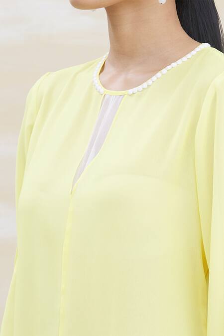 Kommal Sood Beige Georgette Embroidery Round Asymmetrical Tunic at Aza Fashions Kommal Sood_Beige Georgette Embroidery Round Asymmetrical Tunic _at_Aza_Fashions