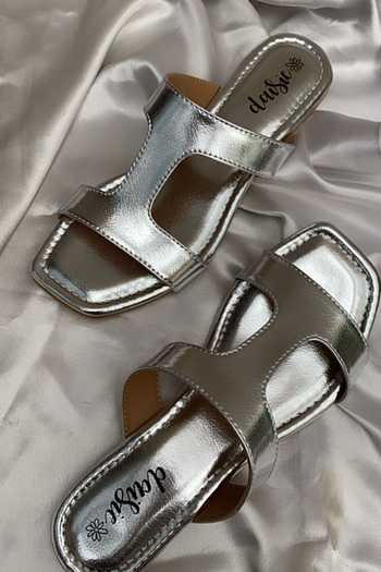 Shop Daisie Silver Faux Leather T-strap Sliders at Aza Fashions Shop_Daisie_Silver Faux Leather T-strap Sliders_at_Aza_Fashions