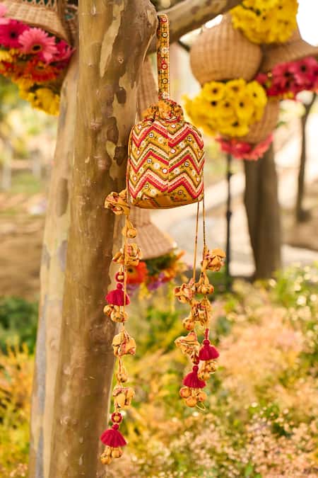 Shop Punit Balana Yellow Embroidery, Tassels Resham Potli Bag at Aza Fashions Shop_Punit Balana_Yellow Embroidery, Tassels Resham Potli Bag _at_Aza_Fashions