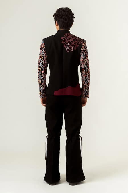 Shop Siddhant Agrawal Black Banana Crepe, Knit Textured Crepe, Flared Trouser With Belt at Aza Fashions Shop_Siddhant Agrawal_Black Banana Crepe, Knit Textured Crepe, Flared Trouser With Belt _at_Aza_Fashions