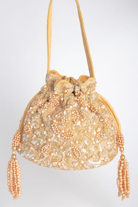 Shop Adora By Ankita Gold Sequins, Pearls, Cut Work Poly Silk Embellished Potli Bag at Aza Fashions Shop_Adora By Ankita_Gold Sequins, Pearls, Cut Work Poly Silk Embellished Potli Bag _at_Aza_Fashions