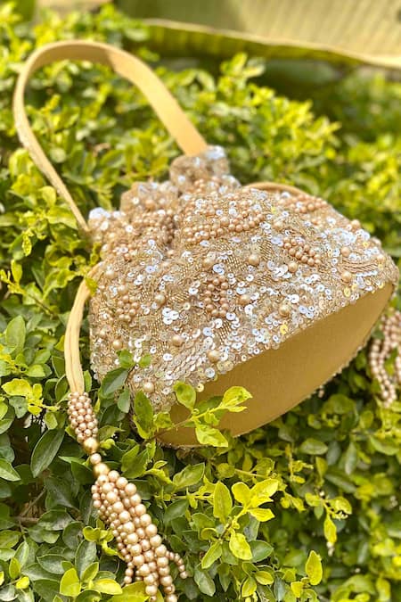 Buy Adora By Ankita Gold Sequins, Pearls, Cut Work Poly Silk Embellished Potli Bag Online at Aza Fashions Buy_Adora By Ankita_Gold Sequins, Pearls, Cut Work Poly Silk Embellished Potli Bag _Online_at_Aza_Fashions