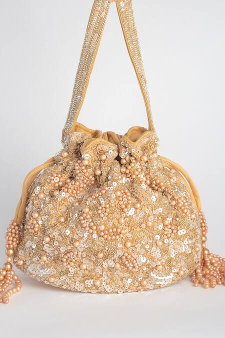 Shop Adora By Ankita Gold Sequins, Pearls, Cut Work Poly Silk Embellished Potli Bag Online at Aza Fashions Shop_Adora By Ankita_Gold Sequins, Pearls, Cut Work Poly Silk Embellished Potli Bag _Online_at_Aza_Fashions