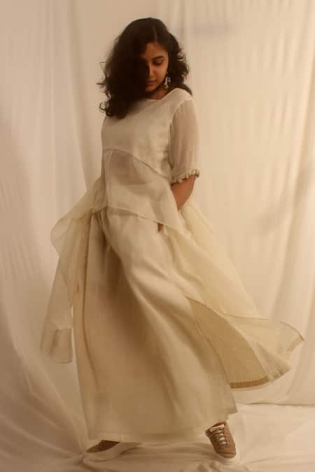 Shwetanga_White , Organic Cowry Shells Square Asymmetric Peplum And Skirt Set _Online_at_Aza_Fashions