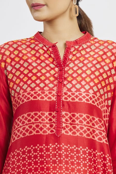 Krishna Mehta Red Chanderi Printed Floral Mandarin Collar Asymmetric Tunic at Aza Fashions Krishna Mehta_Red Chanderi Printed Floral Mandarin Collar Asymmetric Tunic _at_Aza_Fashions