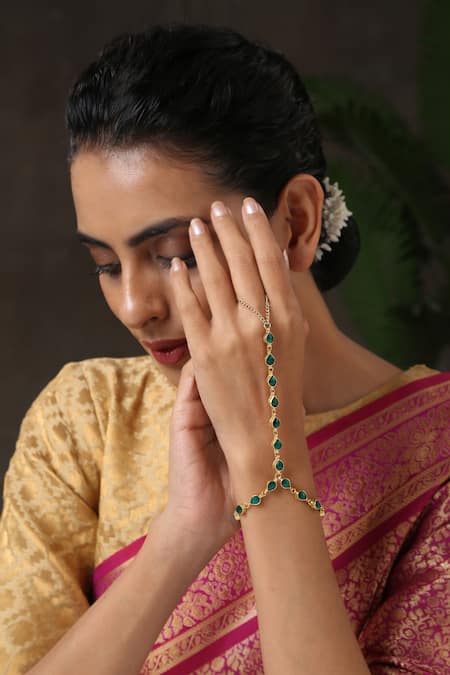 Shop Paisley Pop Gold Plated Stones Teardrop Motif Kundan Hathphool at Aza Fashions Shop_Paisley Pop_Gold Plated Stones Teardrop Motif Kundan Hathphool _at_Aza_Fashions