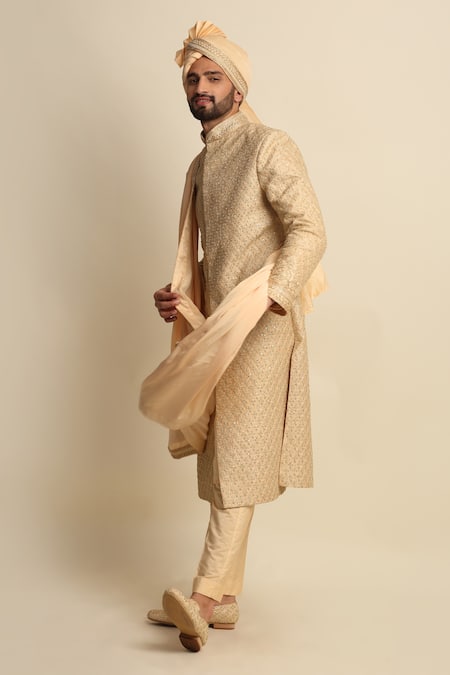 Priyanka Jain_Gold Raw Silk Embroidered Dori Work Sherwani And Kurta Set _Online_at_Aza_Fashions