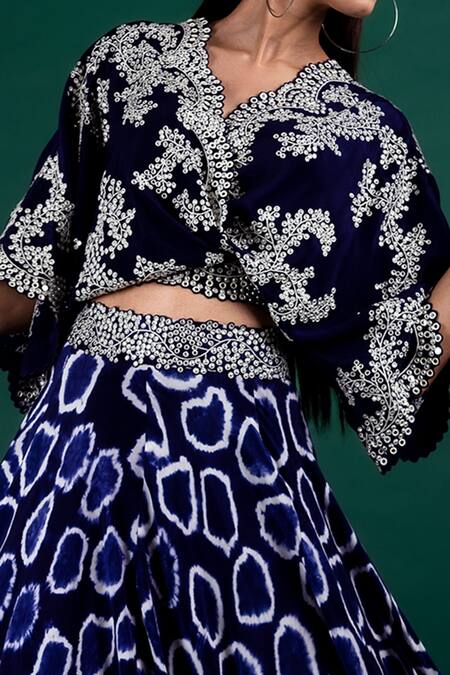 Nupur Kanoi_Blue Crepe Mirror Work, Polka Tie-dye Embroidered Top And Woven Lehenga Set_at_Aza_Fashions