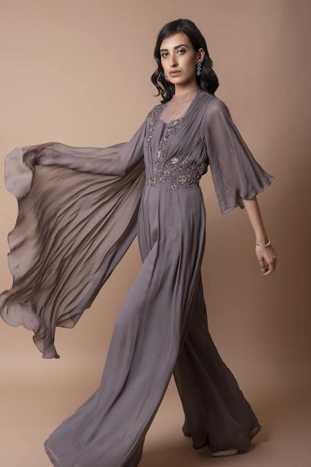 K-Anshika_Grey Georgette Round Asymmetric Drape Jumpsuit_Online_at_Aza_Fashions