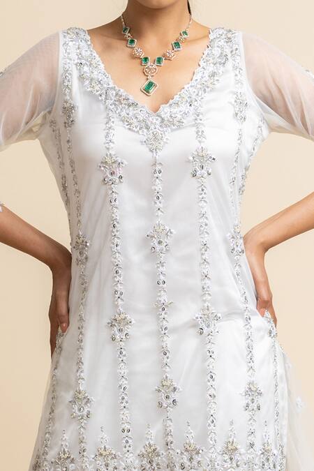 Shop_Nitika Gujral_White Georgette Embroidered Mukaish V Neck Kurta Gharara Set _Online_at_Aza_Fashions