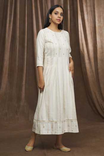 Buy Samyukta Singhania Beige Handloom Cotton Tunic at Aza Fashions Buy_Samyukta Singhania_Beige Handloom Cotton Tunic _at_Aza_Fashions