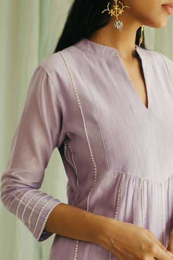 Sureena Chowdhri Purple Silk Chanderi Embroidered Pintucks V Neck Bead Work Kurta Set at Aza Fashions Sureena Chowdhri_Purple Silk Chanderi Embroidered Pintucks V Neck Bead Work Kurta Set_at_Aza_Fashions