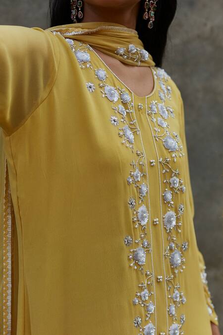 Shop Radha Sharma Yellow Georgette Embroidered Floral Motifs Leaf Neck Kurta Pant Set Online at Aza Fashions Shop_Radha Sharma_Yellow Georgette Embroidered Floral Motifs Leaf Neck Kurta Pant Set _Online_at_Aza_Fashions