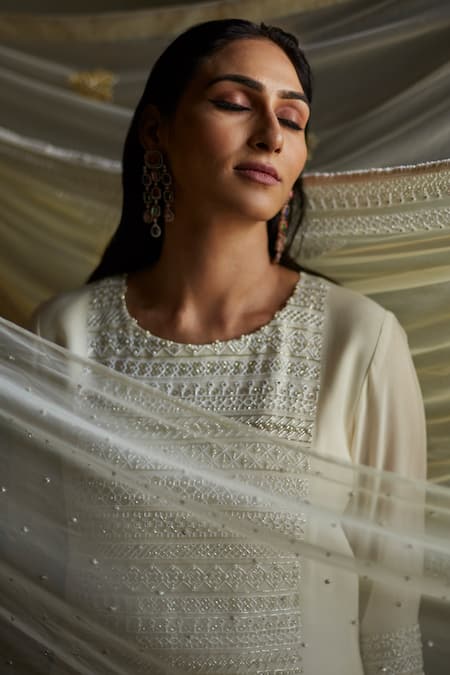 Shop Radha Sharma White Crepe, Georgette, Soft Net Geometric Hand Embroidered Kurta Palazzo Set at Aza Fashions Shop_Radha Sharma_White Crepe, Georgette, Soft Net Geometric Hand Embroidered Kurta Palazzo Set _at_Aza_Fashions