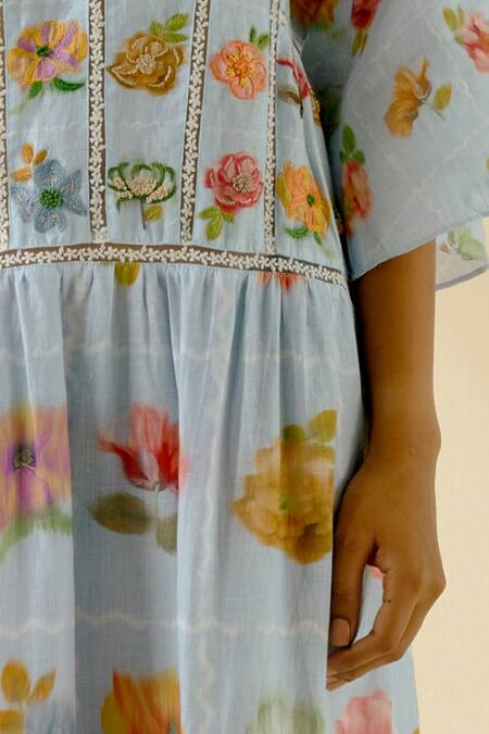 Pozruh By Aiman Blue Hemp Floral V Neck Print Tiered Maxi Dress at Aza Fashions Pozruh By Aiman_Blue Hemp Floral V Neck Print Tiered Maxi Dress_at_Aza_Fashions