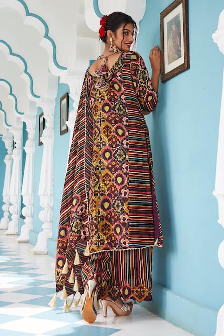 Shop The Royaleum Brown Crepe, Uppada Floral, Geometric Print Straight Kurta Pant Set at Aza Fashions Shop_The Royaleum_Brown Crepe, Uppada Floral, Geometric Print Straight Kurta Pant Set _at_Aza_Fashions