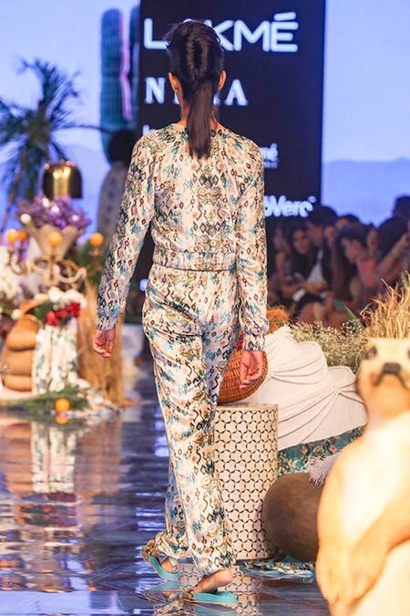 Shop Payal Singhal White Velvet Embroidered Ikat Afrika Printed Bomber Jacket And Jogger Pant Set at Aza Fashions Shop_Payal Singhal_White Velvet Embroidered Ikat Afrika Printed Bomber Jacket And Jogger Pant Set_at_Aza_Fashions