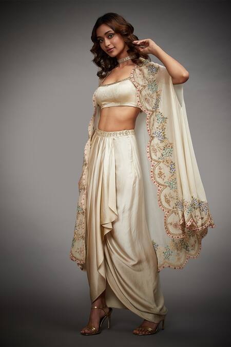 Buy RI.Ritu Kumar Beige Cape - Silk Chanderi Embroidered Floral Cape Scallop And Draped Skirt Set Online at Aza Fashions Buy_RI.Ritu Kumar_Beige Cape - Silk Chanderi Embroidered Floral Cape Scallop And Draped Skirt Set_Online_at_Aza_Fashions