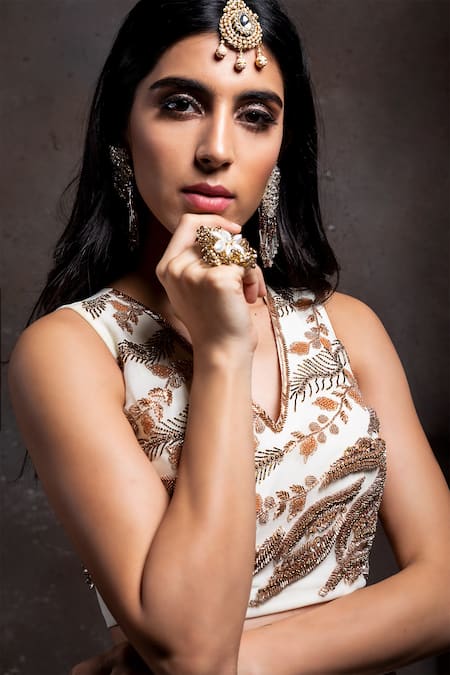 Shop Richa Jaisinghani Label White Georgette Bead , Cutdana V Tassel Pre-draped Saree With Blouse at Aza Fashions Shop_Richa Jaisinghani Label_White Georgette Bead , Cutdana V Tassel Pre-draped Saree With Blouse _at_Aza_Fashions