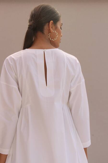 The Summer House White Organic Cotton Cambric Round Natsu Drop Shoulder Tunic And Pant Set at Aza Fashions The Summer House_White Organic Cotton Cambric Round Natsu Drop Shoulder Tunic And Pant Set _at_Aza_Fashions