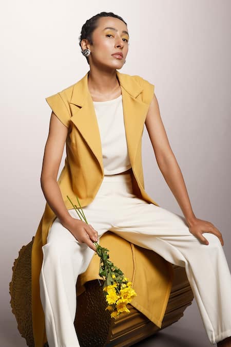 Shop Couché By Anandini White Crepe Lana Stretch Plain Coat Lapel Collar, Crop Pant Set With Duster at Aza Fashions Shop_Couché By Anandini_White Crepe Lana Stretch Plain Coat Lapel Collar, Crop Pant Set With Duster _at_Aza_Fashions