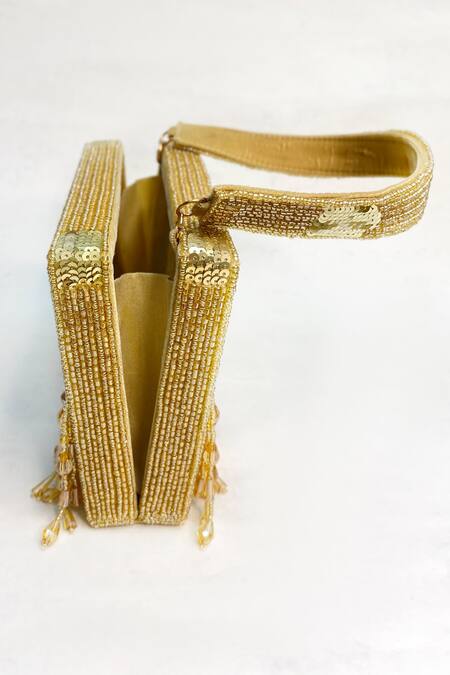 Kainiche By Mehak Gold Sequins, Beads Inara Embellished Handbag Online at Aza Fashions Kainiche By Mehak_Gold Sequins, Beads Inara Embellished Handbag _Online_at_Aza_Fashions