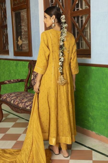 Shop Kritika Dawar Yellow Anarkali Tissue Chanderi, Churidar Lycra Net, Hand Embroidered Set at Aza Fashions Shop_Kritika Dawar_Yellow Anarkali Tissue Chanderi, Churidar Lycra Net, Hand Embroidered Set_at_Aza_Fashions