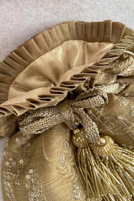 Buy_Amyra_Gold Sequins, Embroidery, Tassels Poly Silk Potli Bag _Online_at_Aza_Fashions