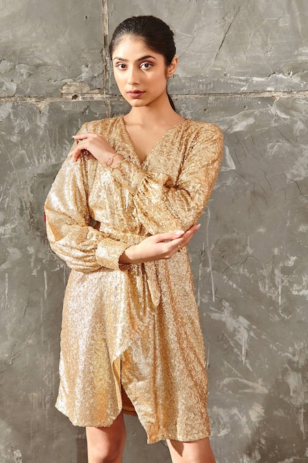 Samatvam By Anjali Bhaskar Gold Georgette Sequin V Neck Embellished Draped Dress at Aza Fashions Samatvam By Anjali Bhaskar_Gold Georgette Sequin V Neck Embellished Draped Dress _at_Aza_Fashions