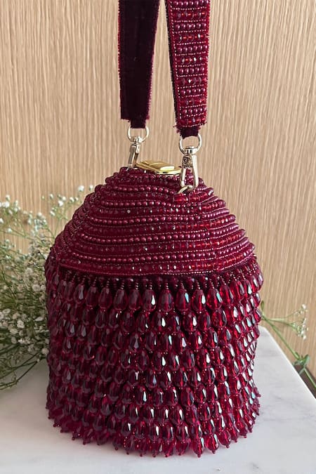Shop Nayaab By Sonia Maroon Embroidery, Beads Suede Polti Bag With Handle at Aza Fashions Shop_Nayaab By Sonia_Maroon Embroidery, Beads Suede Polti Bag With Handle _at_Aza_Fashions