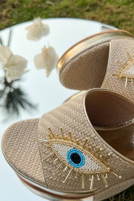 The Alter Beige Embroidery Evil Eye Jute Wedges at Aza Fashions The Alter_Beige Embroidery Evil Eye Jute Wedges _at_Aza_Fashions