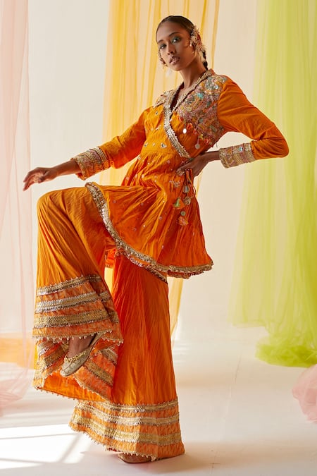 Priyanka Singh Orange Cotton, Mul Silk Mukaish , Sequins, Zardozi Angrakha Gharara Set Online at Aza Fashions Priyanka Singh_Orange Cotton, Mul Silk Mukaish , Sequins, Zardozi Angrakha Gharara Set _Online_at_Aza_Fashions