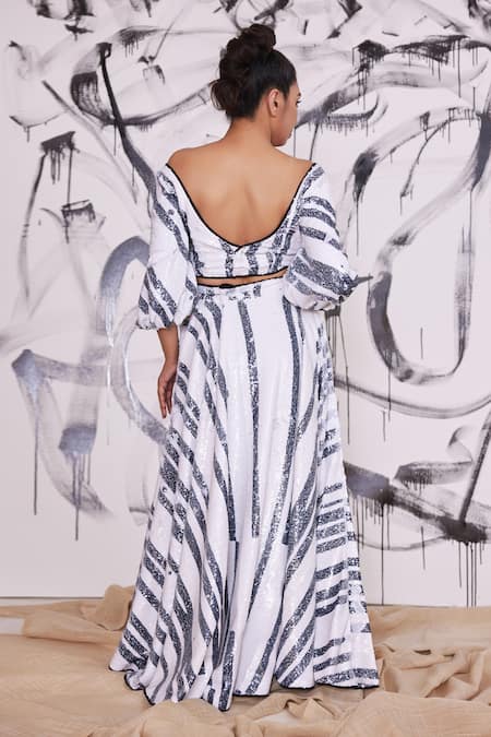 Shop Pooja Bagaria Black Satin Sequin Sequin, Piano Stripe Leaf Neck Embroidered Lehenga Set at Aza Fashions Shop_Pooja Bagaria_Black Satin Sequin Sequin, Piano Stripe Leaf Neck Embroidered Lehenga Set _at_Aza_Fashions