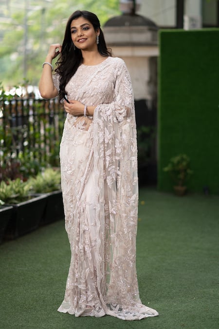 Shop Kalighata Peach Net Sequins Round Snow Embroidered Saree With Blouse at Aza Fashions Shop_Kalighata_Peach Net Sequins Round Snow Embroidered Saree With Blouse _at_Aza_Fashions