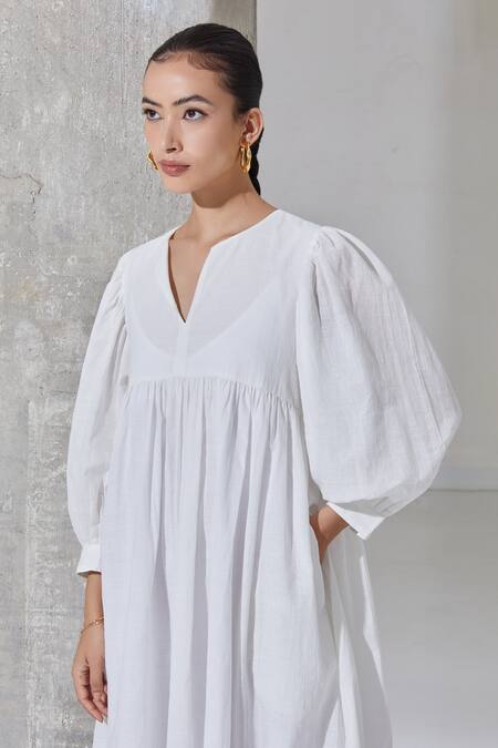 The Summer House White Organic Cotton Round Notched Veallai Dress at Aza Fashions The Summer House_White Organic Cotton Round Notched Veallai Dress _at_Aza_Fashions