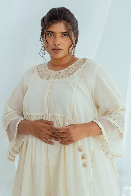 Buy Latha Puttanna White Hand Woven Cotton Floral Motifs Round Kansa Tunic Online at Aza Fashions Buy_Latha Puttanna_White Hand Woven Cotton Floral Motifs Round Kansa Tunic _Online_at_Aza_Fashions