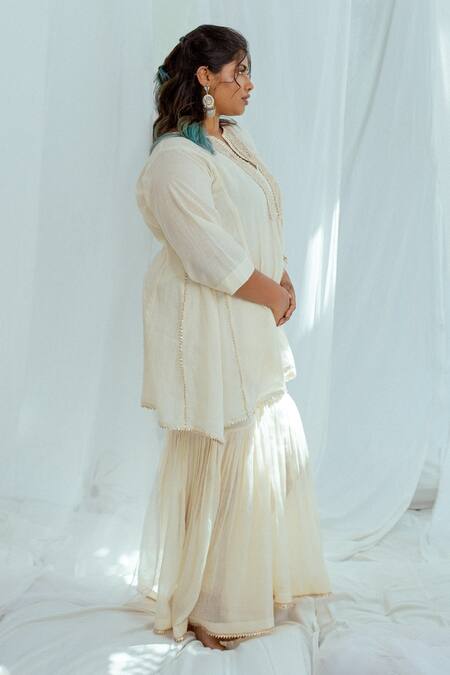 Latha Puttanna White Hand Woven Cotton Floral Motifs Notched Parini Tunic Online at Aza Fashions Latha Puttanna_White Hand Woven Cotton Floral Motifs Notched Parini Tunic _Online_at_Aza_Fashions