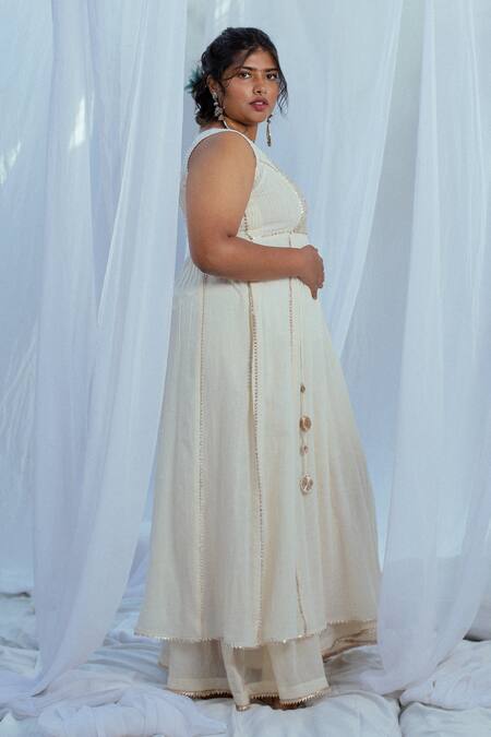 Latha Puttanna White Hand Woven Cotton Floral Motifs Round Rutvi Tunic Online at Aza Fashions Latha Puttanna_White Hand Woven Cotton Floral Motifs Round Rutvi Tunic _Online_at_Aza_Fashions