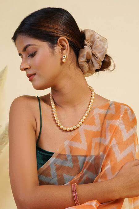 Radhika Sarathkumar in a Pearl Long Necklace! | Fashionworldhub