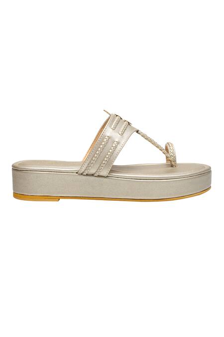 Nidhi Bhandari_Gold Kolhapuri Platform Wedges _Online_at_Aza_Fashions