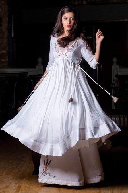 Shop Aaryaa By Kashveen Kohli White Modal Cotton Thread, Beads, Placement Embroidered Anarkali And Palazzo Set at Aza Fashions Shop_Aaryaa By Kashveen Kohli_White Modal Cotton Thread, Beads, Placement Embroidered Anarkali And Palazzo Set _at_Aza_Fashions