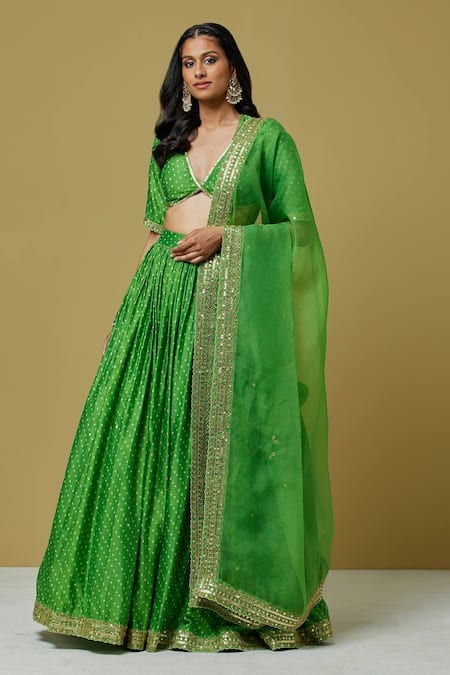 Ikshita Choudhary_Green Organza, Chanderi Sequin, Bandhani V Neck Blouse And Lehenga Set_Online_at_Aza_Fashions