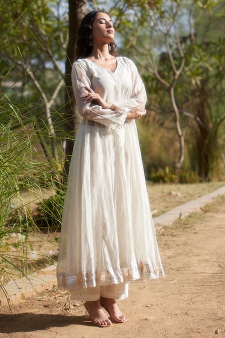 Shop Apeksha Jain Label White Tissue, Chanderi Gota, Kasab V Neck Anarkali And Palazzo Set at Aza Fashions Shop_Apeksha Jain Label_White Tissue, Chanderi Gota, Kasab V Neck Anarkali And Palazzo Set_at_Aza_Fashions