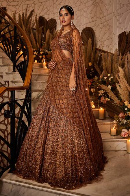 Buy_Surabhichopralabel_Brown Tulle Hand Embroidered Cutdana Work V Neck Bridal Lehenga Set_Online_at_Aza_Fashions